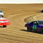 Samantha Stevens (55) leads Jack Parshall (9) around a corner during a Super Stocks race on Saturday at Grays Harbor Raceway. (Photo by AR Racing Videos)