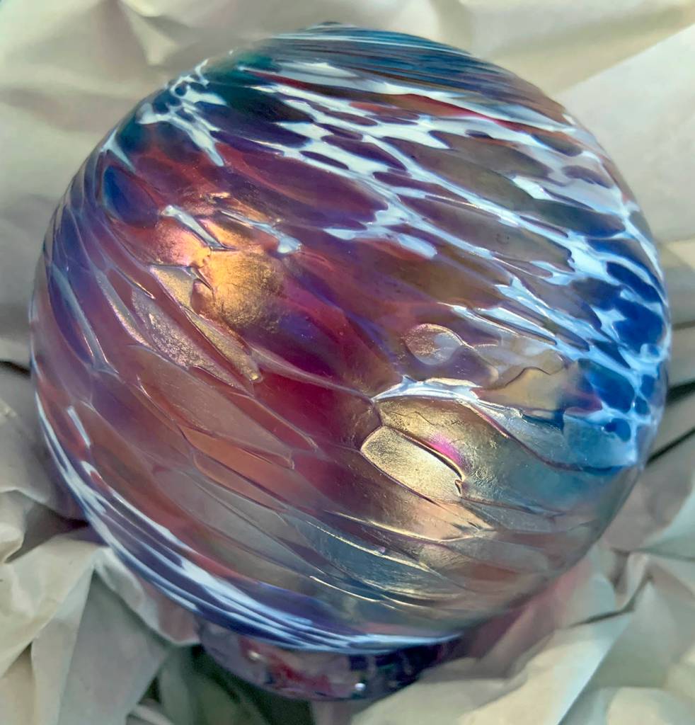 Kat Bryant | Grays Harbor News Group                                Opal Art Glass of Cosmopolis donated this softball-sized textured glass globe for the auction.