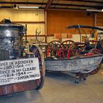 Dan Hammock | Grays Harbor News Group                                 Some of the artifacts saved from the 2018 fire that swept through the Aberdeen Museum of History, including a plywood boat and an 1855 fire cart, are being stored at a facility on Port Industrial Road as the museum searches for a new home.