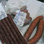 An assortment of the meat and cheeses packaged at the shop. (Doug Barker | For Washington Coast Magazine)