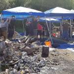 COURTESY MASON COUNTY SHERIFFS OFFICE                                Investigators set up canopies as they search for evidence.