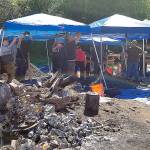 COURTESY MASON COUNTY SHERIFFS OFFICE                                Investigators set up canopies as they search for evidence.