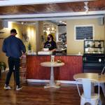 Urban Juice Factory employee Tessa Johnson, right, assists a customer on Tuesday. The Montesano smoothie bar began an extended closure on Wednesday to begin a business expansion that will include a full-service kitchen. The business plans to re-open late this month. (Ryan Sparks | The Daily World)