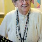 Photo by Dee Anne Shaw                                Ruth McCausland proudly sported a sash reading Its my 100th birthday! during a celebration held in July 2019.