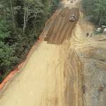 COURTESY GRAYS HARBOR COUNTY                                 A drone photo shows the construction on Blue Slough Road. The project takes out the curves at around the 2.5-mile mark of the roadway, which is expected to reopen by the end of October.