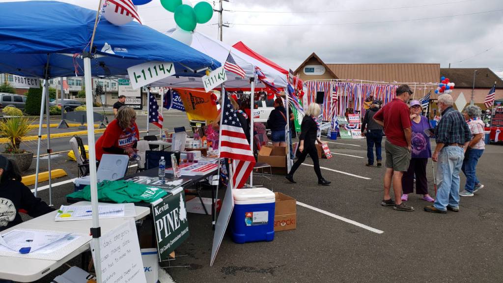 A row of booths line one side of the Harbor Freedom Rally held on Saturday in Aberdeen. (Ryan Sparks | The Daily World)