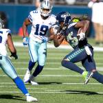 Seattle cornerback Shaquill Griffin runs back an interception in the second quarter against the Dallas Cowboys on Sunday at CenturyLink Field in Seattle. (Bettina Hansen /The Seattle Times)