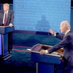 Pool Photo                                 President Donald Trump and former Vice President and Democratic presidential nominee Joe Biden speak during the first presidential debate Tuesday night in Cleveland, Ohio.