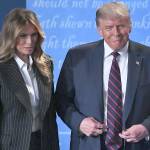President Donald Trump and First Lady Melania Trump leave after the first presidential debate at Case Western Reserve University in Cleveland on Tuesday. Both are showing mild symptoms after testing positive for Covid-19 on Thursday. President Trumpss age, sex and weight status increases his risk of developing a severe case of COVID-19. (SAUL LOEB/TNS)