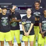 Sue Bird of the Seattle Storm holds on to the WNBA Championship Trophy after defeating the Las Vegas Aces, 92-59, in Game 3 of the WNBA Finals at Feld Entertainment Center in Palmetto, Florida, on Tuesday. (Julio Aguilar/Getty Images)