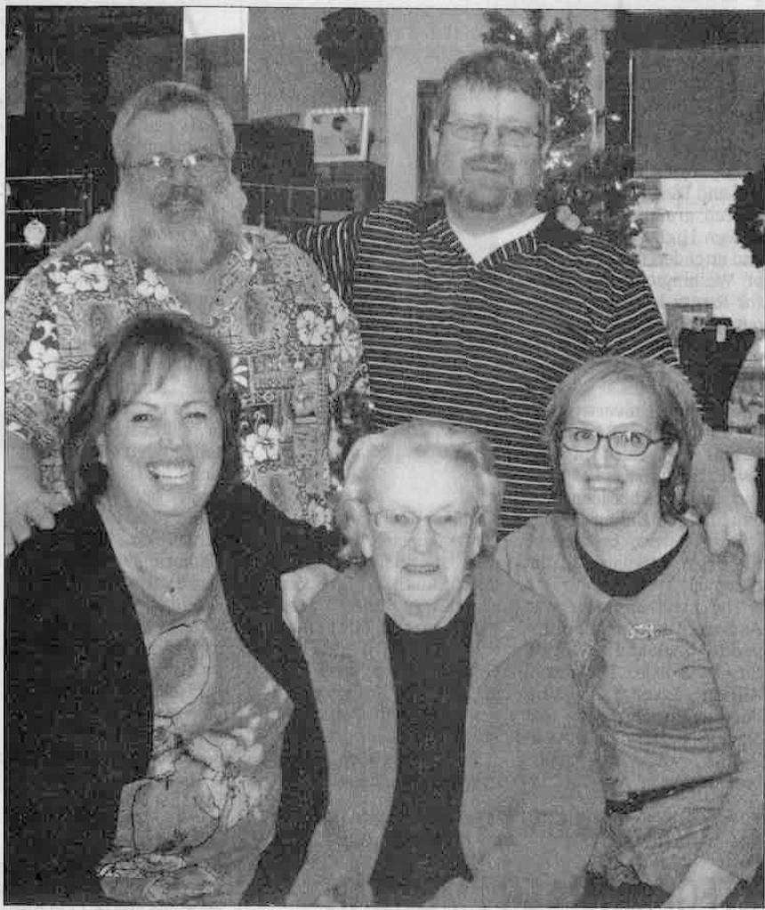 The late Bonnie Giron, center, ran the store for years. She is pictured here surrounded by her sons, Frank Heronsen, left, and Mike Giron, and daughters Peggy Klinger, bottom left, and Sherri Hughes, in a family portrait taken during the holidays in 2012 (Daily World file photo)