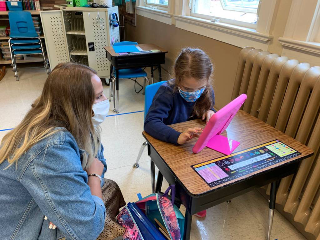 A St. Mary School student receives one-on-one instruction as part of the schools hybrid instructional program to incorporate in-person and remote-learning models. (Photo courtesy of St. Mary School)