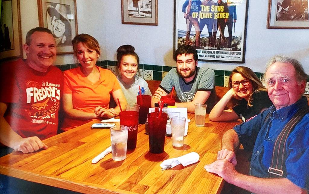 SUBMITTED PHOTO Dave Agner, far right, sits with family members (from left) son-in-law Vincent Pray, daughter Christy Pray, and grandchildren Sophie, Valen and Emma Pray.