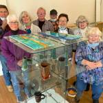 Ten local artisans have established the Grays Harbor Potters Guild at 2244 Simpson Ave. in Hoquiam. They plan to open their space next weekend for demonstrations and retail sales. Initial hours will be 10 a.m. to 3 p.m. every Friday through Sunday. Pictured, from left, are Gary Ganz, Lyn Nelson, Cindy Dana, Ken Slaughter, Richard Young, Evie Cheung, Melanie Knight and Pam Otteson. The two members not pictured are Sandy Early and Nancy Williams. Watch The Daily World next week for the full story.
Photo by Kat Bryant | The Daily World