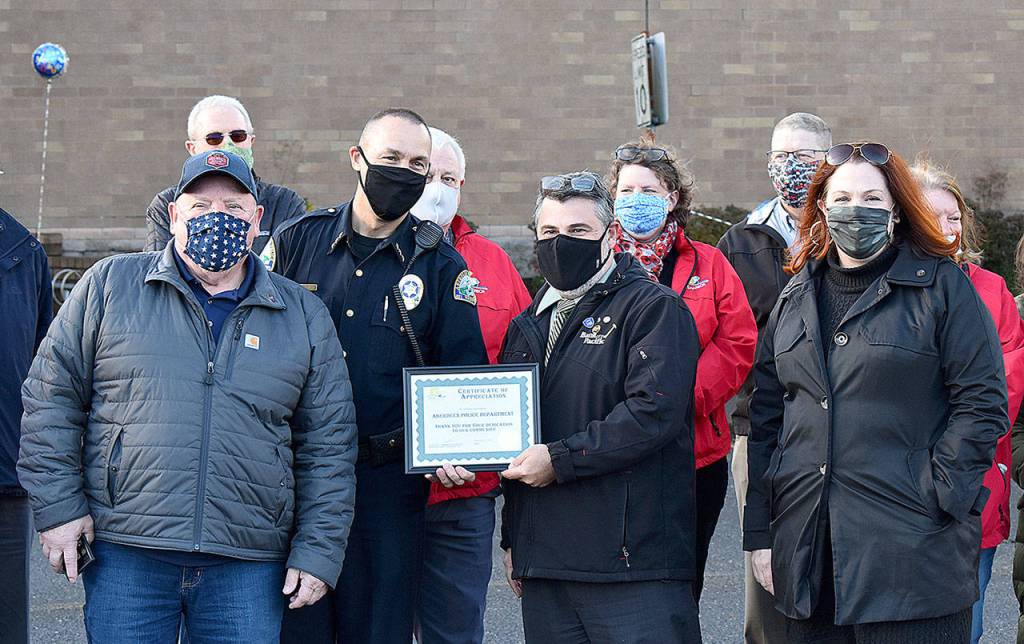 DAN HAMMOCK | GRAYS HARBOR NEWS GROUP 
From left, Aberdeen Mayor Pete Schave, Aberdeen Police Chief Steve Shumate, Greater Grays Harbor Inc board director Tony Enzler, and Greater Grays Harbor CEO Lynnette Buffington.