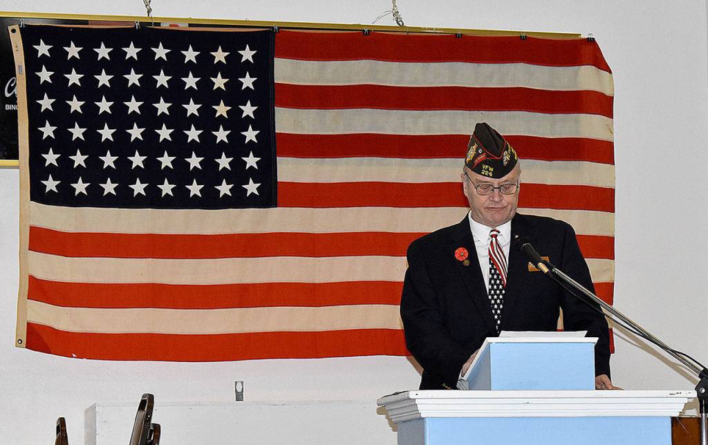 DAN HAMMOCK | THE DAILY WORLD 
Veterans were honored at the Aberdeen VFW post Wednesday. Former post commander Jim Daly read the history of Veterans Day as part of the ceremony.