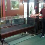 JOHN LARSON | POLSON MUSEUM 
Richard Mirau with one of the six vintage display cases he donated to the Polson Museum Nov. 6.
