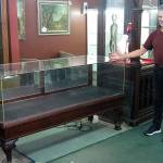 JOHN LARSON | POLSON MUSEUM 
Richard Mirau with one of the six vintage display cases he donated to the Polson Museum Nov. 6.