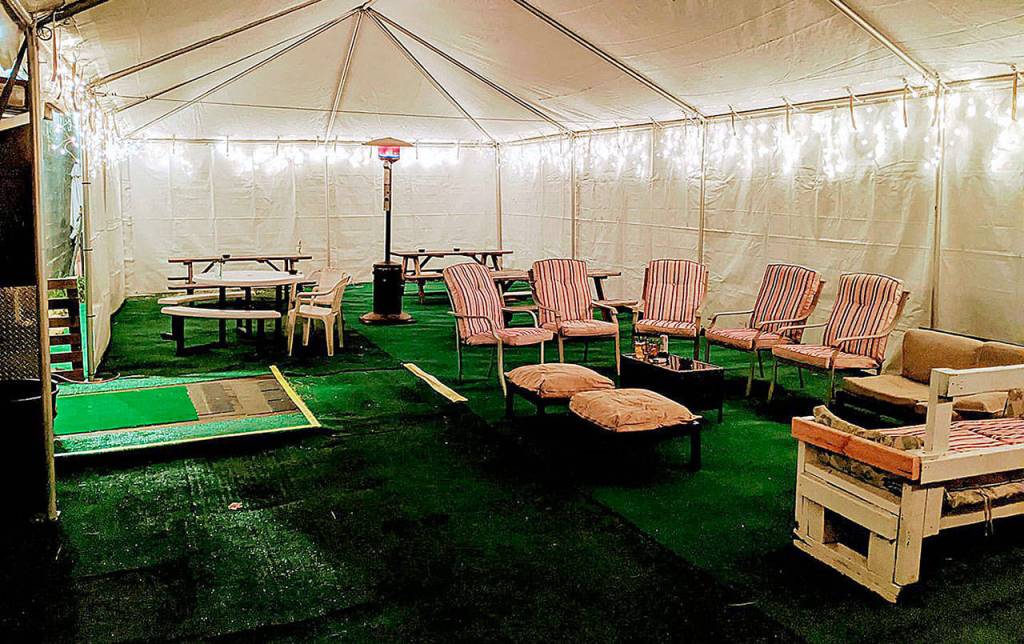 COURTESY PHOTO
The tented outdoor seating area at Ashley's Pub Haus was open for business Saturday.