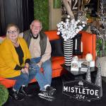 DAN HAMMOCK | THE DAILY WORLD 
Mary Craig and her dad, Paul Metke, at the Grand Heron gift shop in downtown Aberdeen.