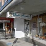 DAN HAMMOCK | THE DAILY WORLD 
Neighboring businesses in downtown Aberdeen show the variety shoppers can easily find within a few blocks: Quilt Harbor and GH Wine Sellars on Broadway Street.