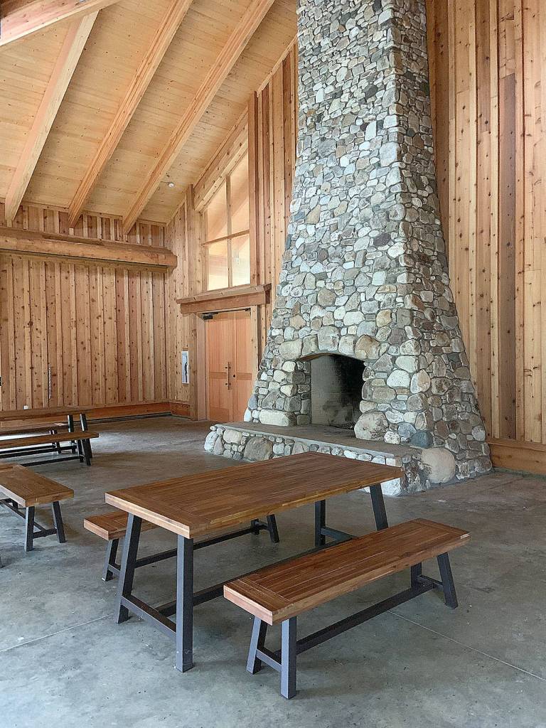 KAT BRYANT | THE DAILY WORLD 
This massive stone fireplace helps keep the pavilions interior warm during the stormy months.