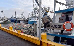 DAN HAMMOCK | THE DAILY WORLD 
The commercial Dungeness crab season has been delayed through at least Dec. 16 this year due to low meat levels. Here, crabbers in Westport prepare for last years opener, which didnt come until late January.