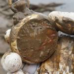 Photo by Marcy Merrill
North Cove photographer and artist Marcy Merrill leads mudlarking outings at the mouth of the Chehalis River, where she has discovered a plethora of artifacts.