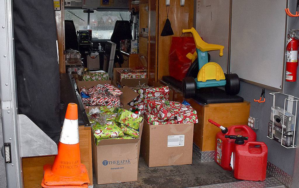 DAN HAMMOCK | THE DAILY WORLD 
A generous Hoquiam community and businesses allowed the Hoquiam Police Department to load its mobile command post vehicle with toys for local kids in need.