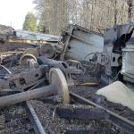 RYAN SPARKS / THE DAILY WORLD 
Six boxcars carrying grain derailed Monday afternoon in Montesano. Crews were working to upright and remove the cars Tuesday morning.