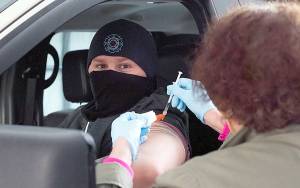 COURTESY GRAYS HARBOR COMMUNITY HOSPITAL 
An Aberdeen first responder receives a first dose of the Pfizer COVID-19 vaccine at Grays Harbor Community Hospital.