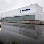 A car passes by Boeing's Advanced Developmental Composites facility on East Marginal Way S. in Seattle on Tuesday, Jan. 5, 2020. The building has housed many secretive research projects. It was here Boeing perfected the manufacturing methods used to fabricate large parts of the B-2 Stealth bomber in the early 1990s and the wings of the 787 in the 2000s. Boeing now plans to close the facility. (Ellen M. Banner/Seattle Times/TNS)