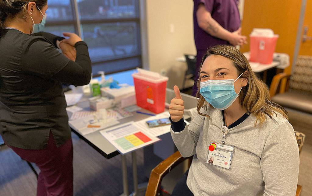 COURTESY SUMMIT PACIFIC MEDICAL CENTER 
Kaylyn Wayman, ARNP and Primary Care Provider at Summit Pacific Medical Center, was among the first-phase personnel to get her COVID-19 vaccination at the hospital.