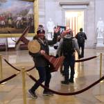 Win McNamee/Getty Images 
Adam Johnson, 36, of Parrish, Fla., faces felony charges after he was seen carrying House Speaker House Nancy Pelosis lectern through the U.S. Capitol on Jan. 6.