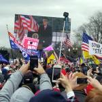 PHOTO BY PHILLIP PINE Attendees watch the President give a speech during a pro-Trump rally on Wednesday, Jan. 6 in Washington D.C.