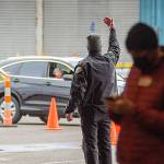 CHRIS MAJORS | GRAYS HARBOR COMMUNITY HOSPITAL 
A vehicle is directed into the countys mass vaccination site in Aberdeen during the first week of operation.