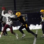 RYAN SPARKS / THE DAILY WORLD
Aberdeens Austin Neeley, center, pressures WF West quarterback Gavin Fugate during the Bobcats 42-0 loss Monday at Stewart Field in Aberdeen.