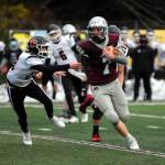 DOUG AMES / THE DAILY WORLD 
Montesano running back Aydan Darst escapes the tackle of Teninos Jeffery Bert during the Bulldogs 23-6 victory on Monday in Montesano.