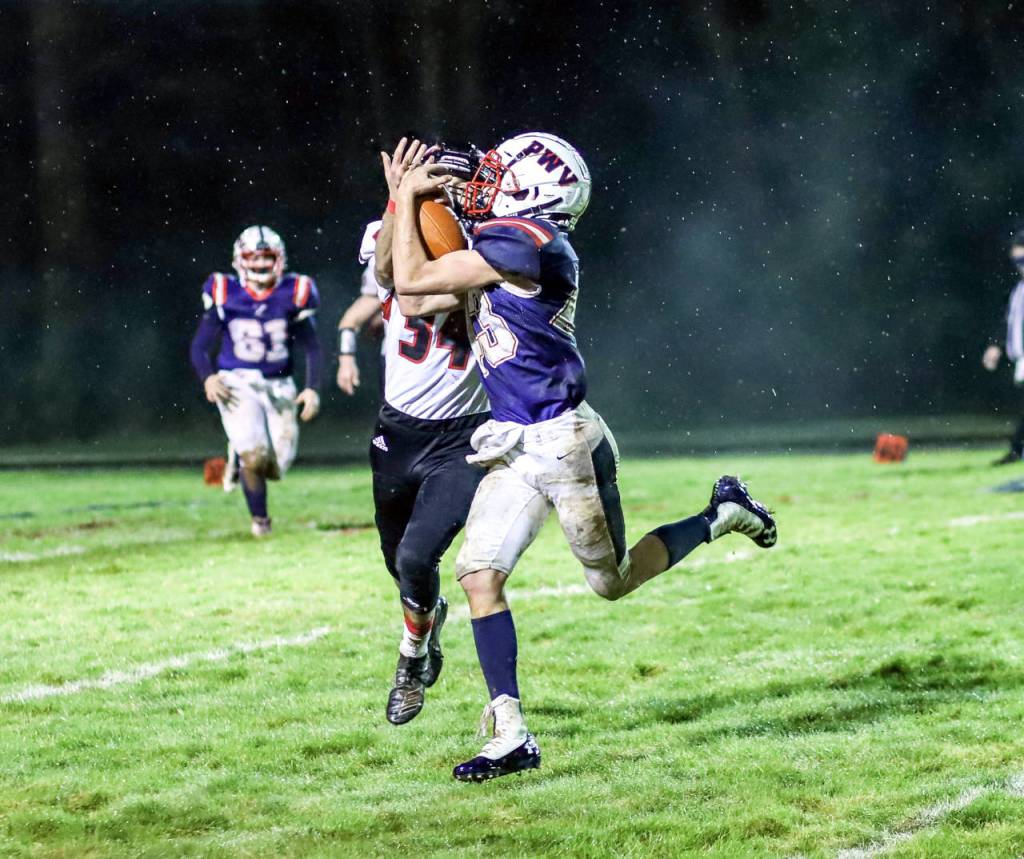 Pe Ell-Willapa Valley receiver Kolton Fluke makes a catch during Fridays game against Toledo in Menlo. (Photo by Larry Bale)