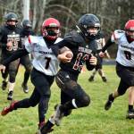 Ocostas Andrew Martin scored the Wildcats only touchdown of the game in a 36-8 loss on Saturday in Westport. (Photo by Jennifer Raffelson)