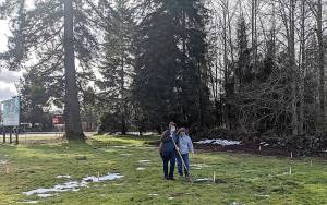 (Photo by Dave Haviland) Drs. Sonnya Wilkins, left, and Corrie Hines pose on the ground theyre planning for a new facility for wounded raptors, just outside Montesano.