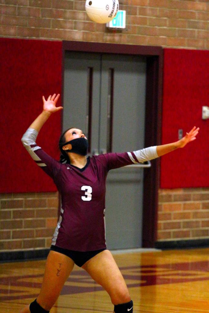 Montesano setter Myah Gallinger serves during the Bulldogs 3-1 victory over Elma on Tuesday. Gallinger had a game-high 31 assists in the victory. (Ryan Sparks | The Daily World)