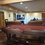 DAVE HAVILAND | THE DAILY WORLD
Couches, TV, a pool table and a computer area are seen from the common area.