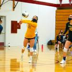 Aberdeen libero Julizza Ambrocio-Felipe (21) makes a pass during the Bobcats 3-0 loss to WF West in a district playoff game on Tuesday in Chehalis. (Eric Trent | The Chronicle)