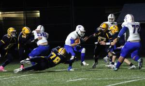 Ryan Sparks | The Daily World 
Rochester quarterback Parker Mcaferty is chased by Aberdeens Seth Brown (78) during a game at Stewart Field in Aberdeen. Brown was named a first-team defensive end.