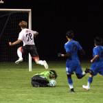 Elma goal keeper Mak Flores makes a save during the second half of Elmas 7-0 victory over Tenino on Wednesday at Davis Field in Elma. (Ryan Sparks | The Daily World)