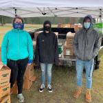 TYLER RENZ | ELMA FFA ADVISOR 
Elma FFA members helped distribute 1,700 California redwood and giant sequoia seedlings at a PropagationNation giveaway at the Elma Fairgrounds March 20 and 21. Pictured from left are Alyssa Pearson, Skyler Putt and Sam Gillis.