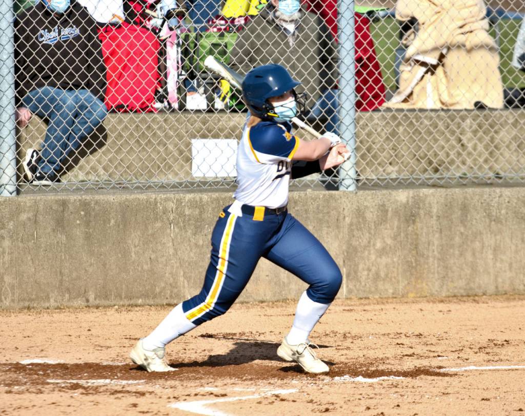 Aberdeen second baseman Logan Glanz belts an RBI double in the second inning of Aberdeens 15-3 season-opening loss to Tumwater on Monday at Bishop Sports Complex in Aberdeen. (Ryan Sparks | The Daily World)