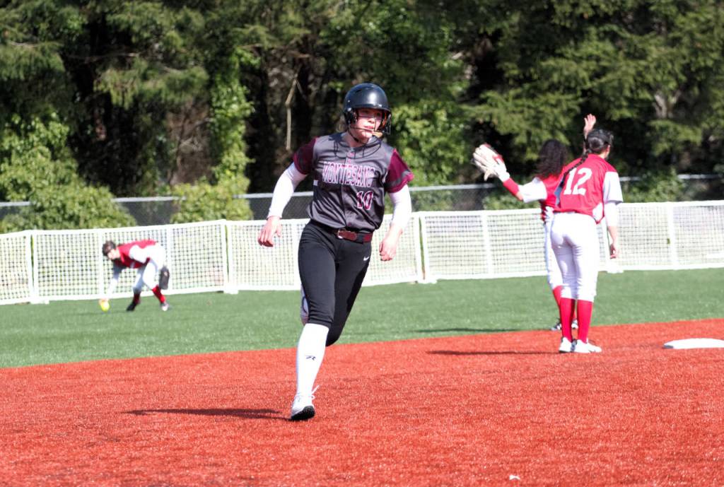 Montesano senior Jessica Stanfield heads for third base during the Bulldogs 14-11 win on Tuesday at Montesano High School. (Ryan Sparks | The Daily World)