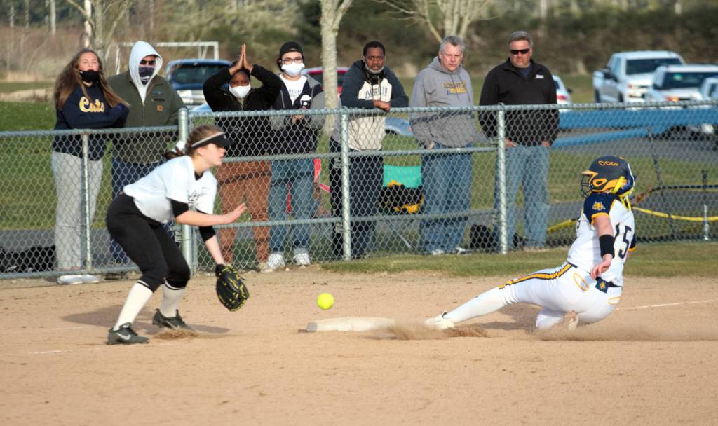 Aberdeens Merryn Bruner slides in safely to third base after hitting an RBI triple in the sixth inning of the Bobcats 14-13 victory over Shelton on Monday at Bishop Sports Complex in Aberdeen. (Ryan Sparks | The Daily World)